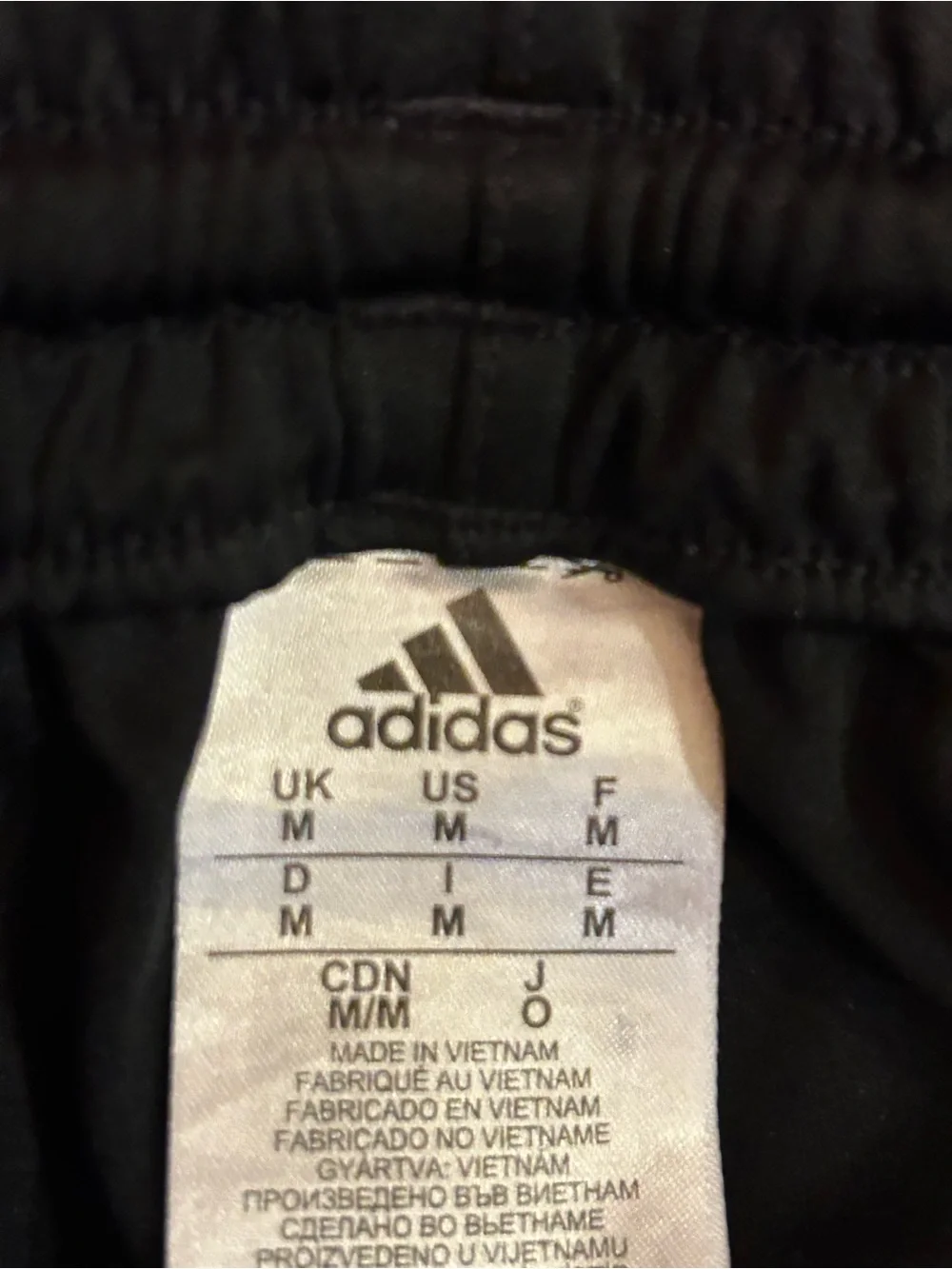 adidas Black Shorts with Teal Side Stripes